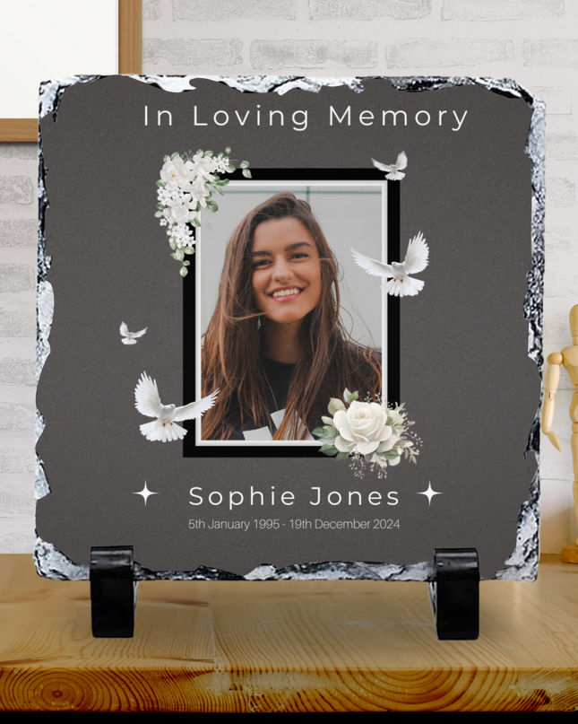 In Loving Memory Design photo slate with glossy finish featuring a framed portrait, white doves, floral accents, and personalized text.