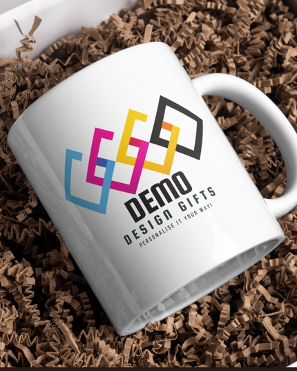 Branded mug with colorful geometric logo in gift packaging perfect for office use and promotional events