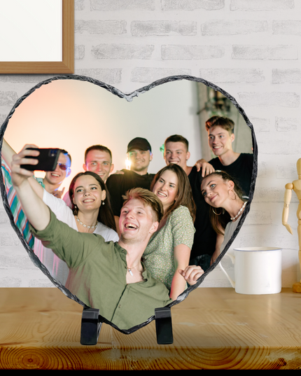 Heart shape photo slate with group selfie on wooden table display