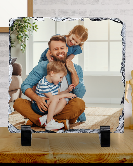 Glossy finish photo slate featuring a happy dad with two children, displayed on black stand feet.